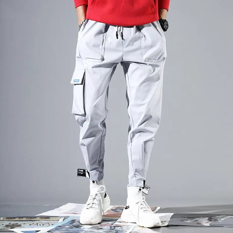 Men's cotton slacks with Velcro fastening in Black and Grey, available in sizes S to XXXL