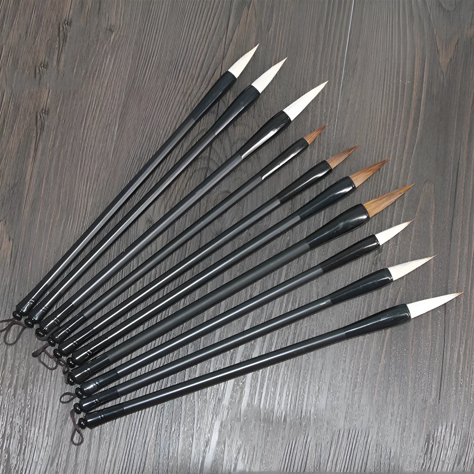 Student writing brush with steel barrel and traditional brush head, 23cm long