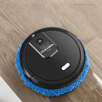 Automatic sweeping robot with wet and dry mopping cloths on a tile floor, showing slim 65mm body