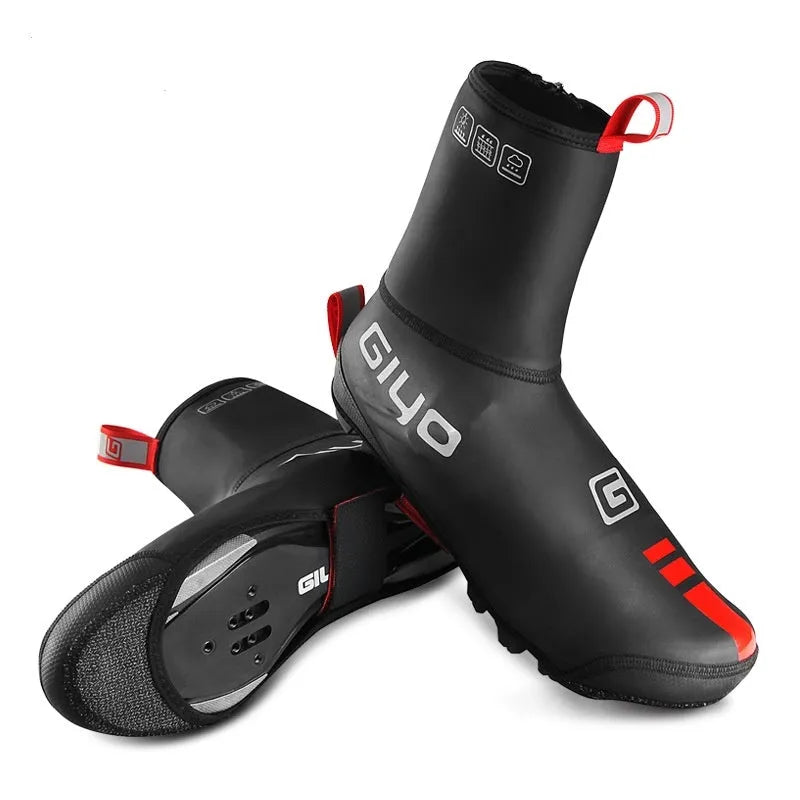 Giyo black cycling waterproof shoe covers with Kevlar and PU construction on a road bike