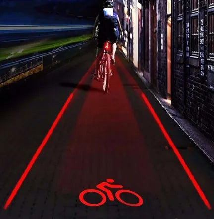 Black and red bicycle laser taillight with 5 LED indicators and adjustable clamp on a bike seatpost