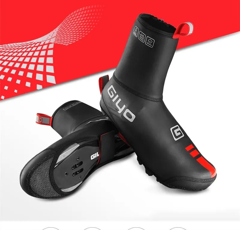 Giyo black cycling waterproof shoe covers with Kevlar and PU construction on a road bike