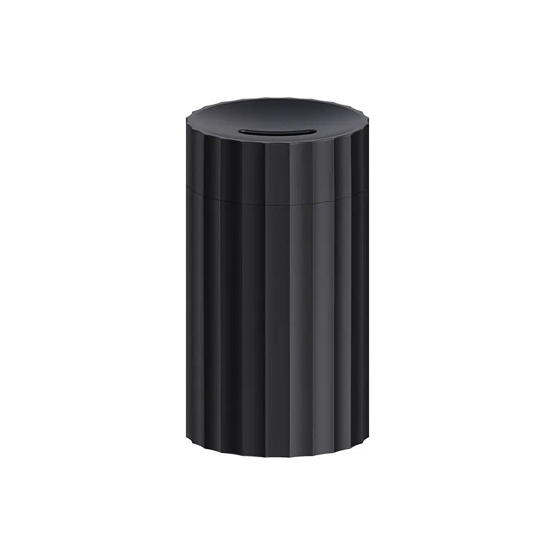 Black and white flame effect essential oil diffuser and air humidifier with coloured LED lights on a wooden table.