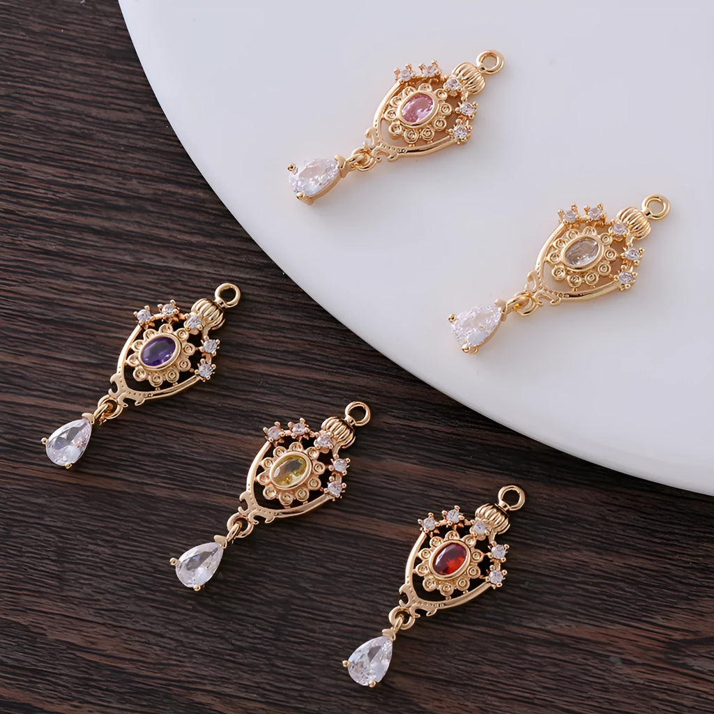 Small crown hollow water drop pendant with micro inlaid zircon details in five colours.