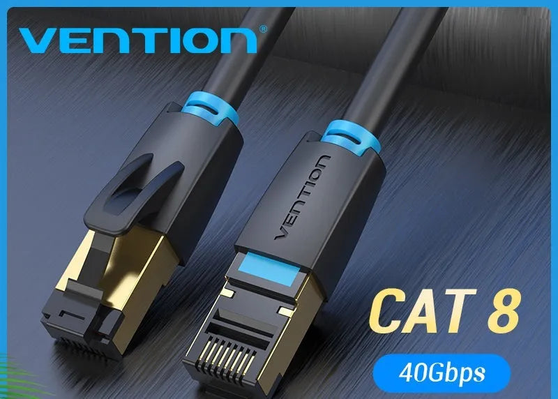Flat and round styles of a black Cat8 shielded Ethernet cable with RJ45 plugs on a wood desk.
