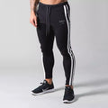 Men's cotton stretch running sweatpants in black with elastic waistband for fitness and leisure use