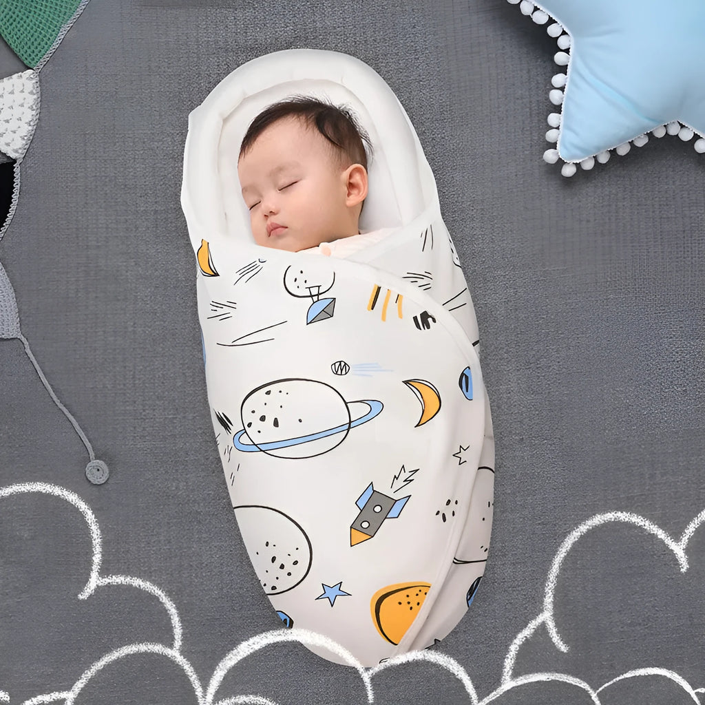 Pure cotton baby swaddle in a dinosaur print, shown laid flat at 30 by 60 cm.