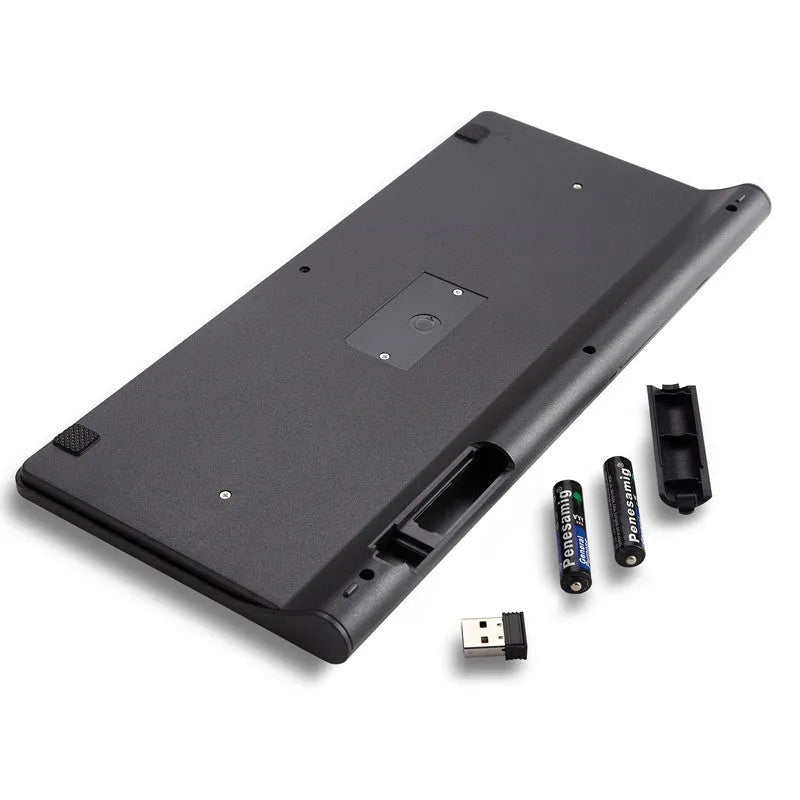 Black wireless keyboard and mouse set with 4G USB receiver on wooden desk
