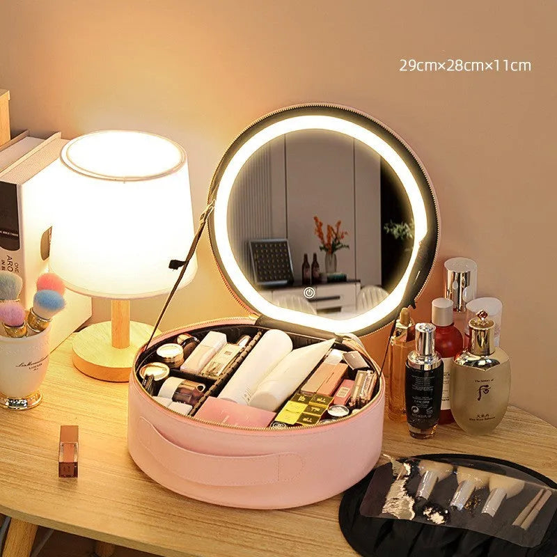 Round smart LED makeup bag with integrated mirror lights in cherry blossom pink colour with lattice partitions visible