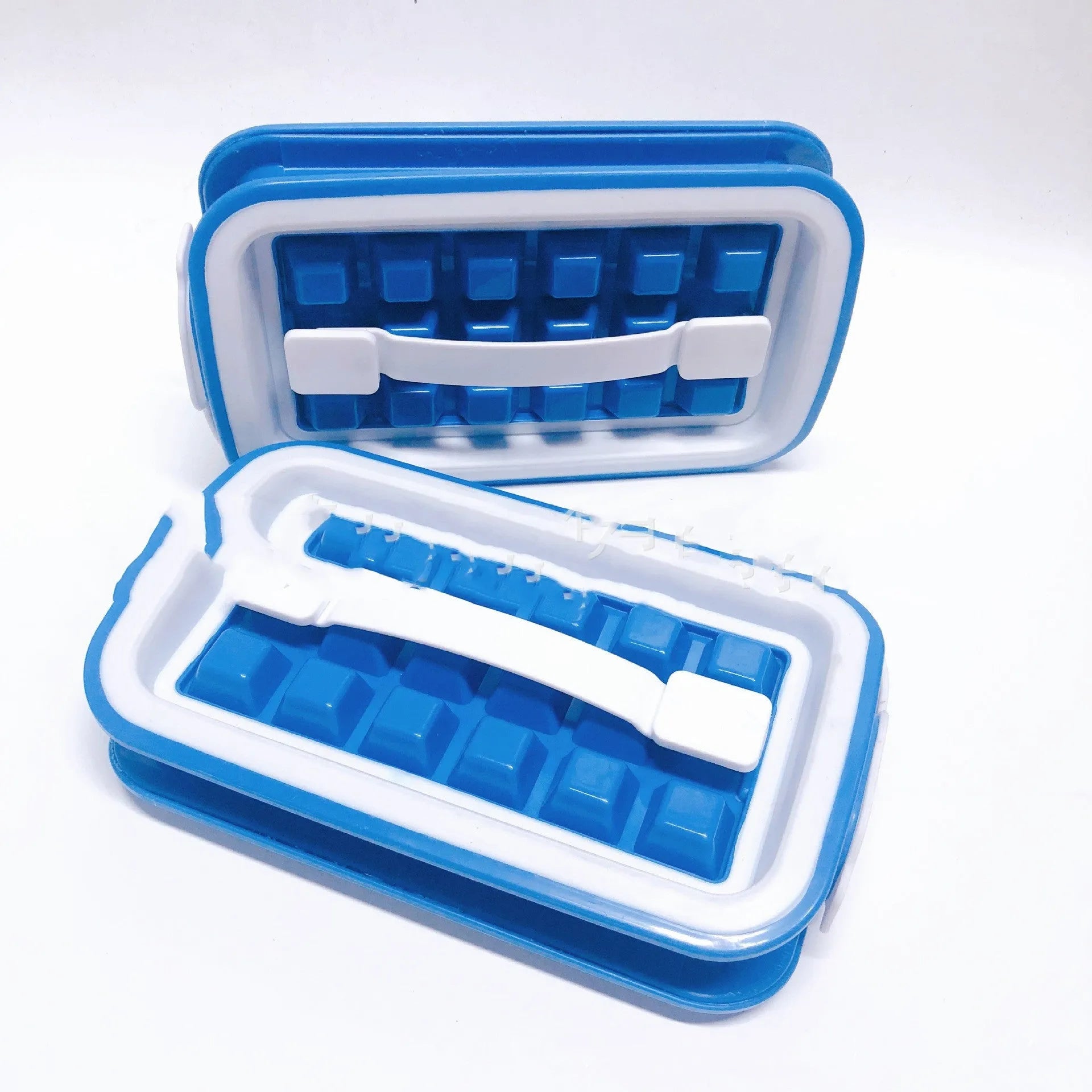 Blue silicone ice cube tray with 36 square cavities and a lid on a wooden table