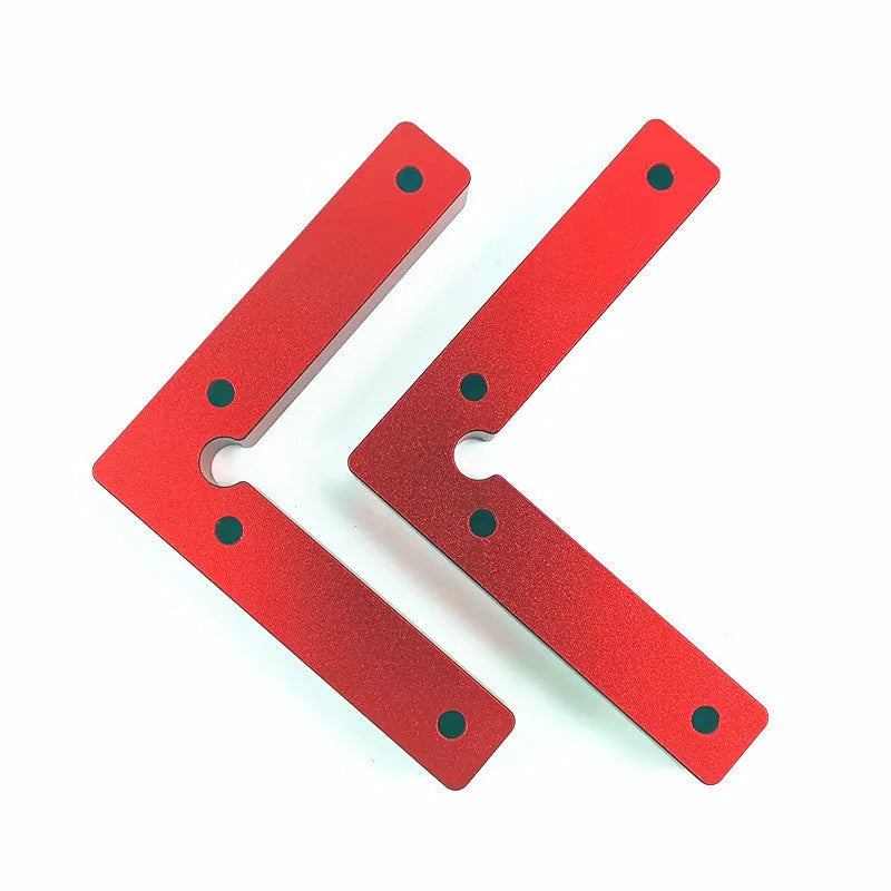 Aluminium alloy right angle positioning block for woodworking jigsaws with measurement scale.