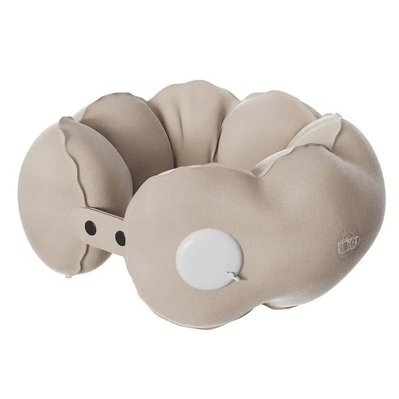 Cloud bubble coloured U-shaped travel pillow with cartoon print, folded compactly for transport.