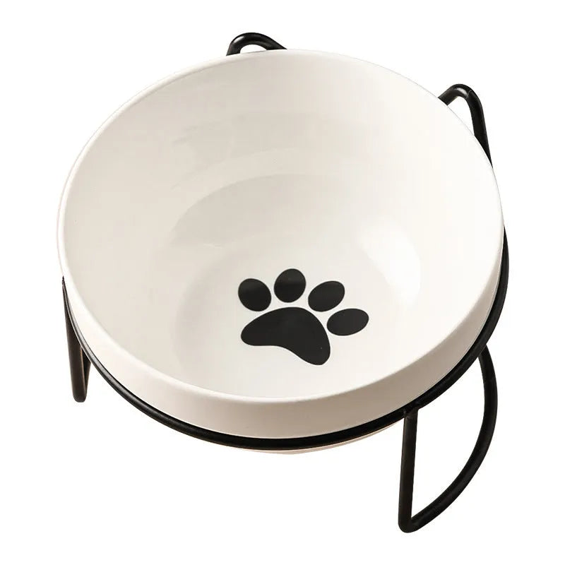 White ceramic cat bowl with decorative iron frame in cat ear design