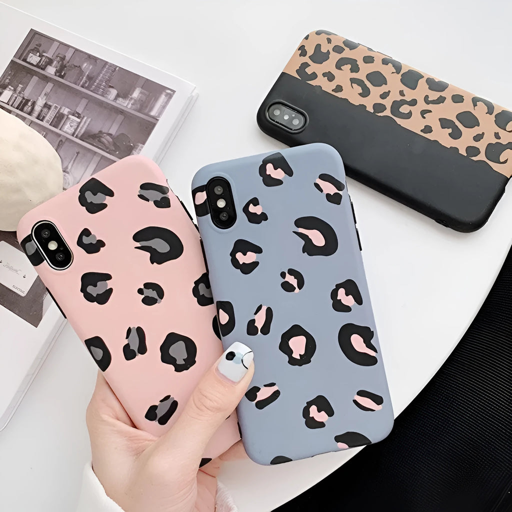 Leopard print mobile phone case for iPhone in black, blue, and pink colours