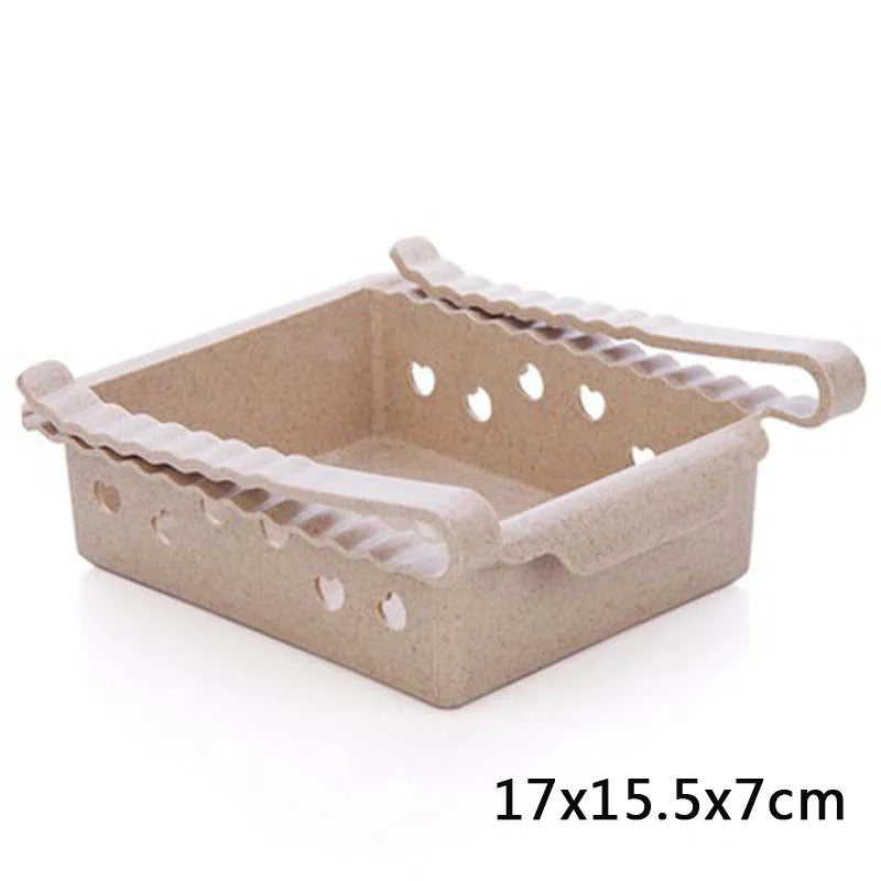 Hanging plastic refrigerator storage rack with drawer compartments and clapboard design for kitchen organisation