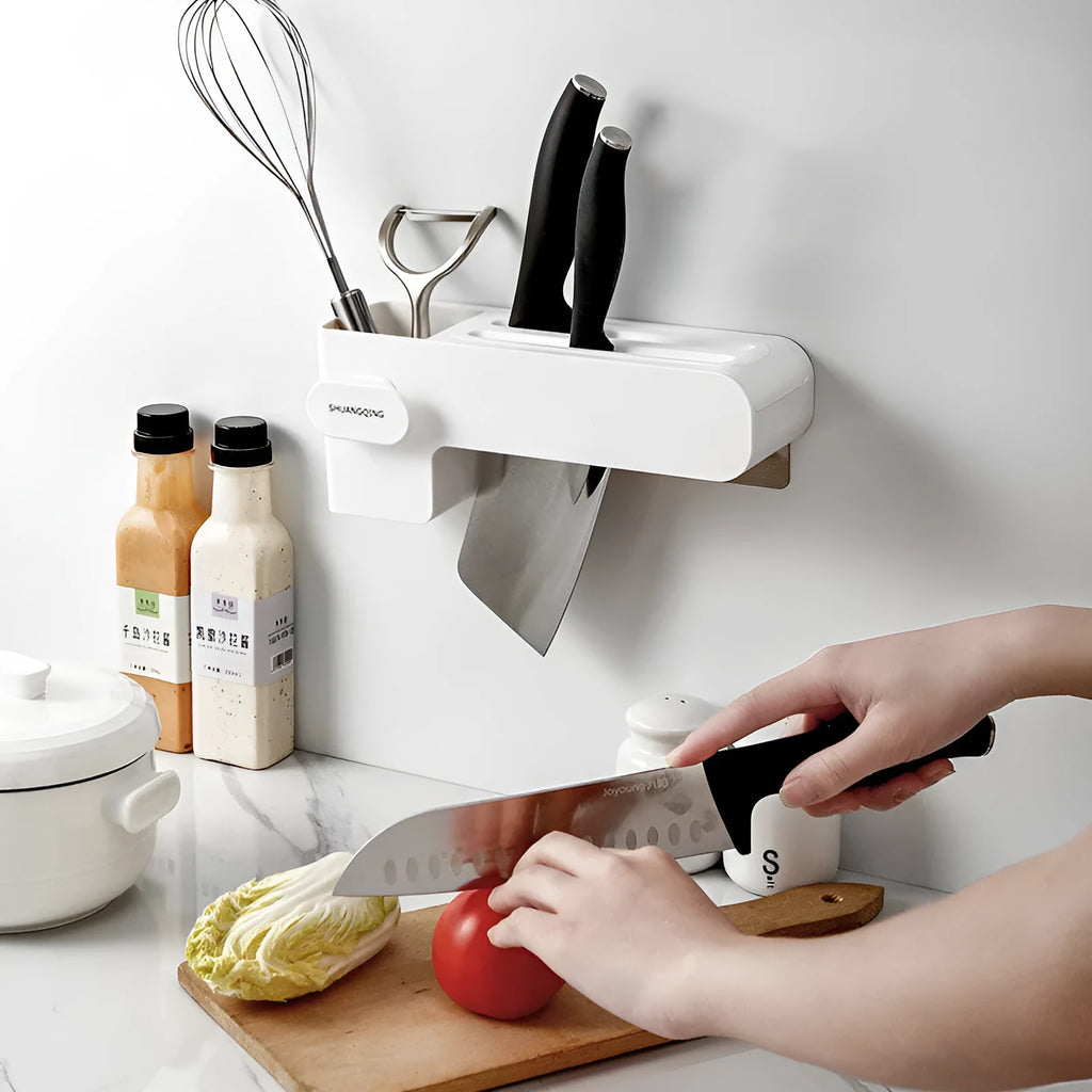 White plastic wall-mounted kitchen knife rack for utensil storage