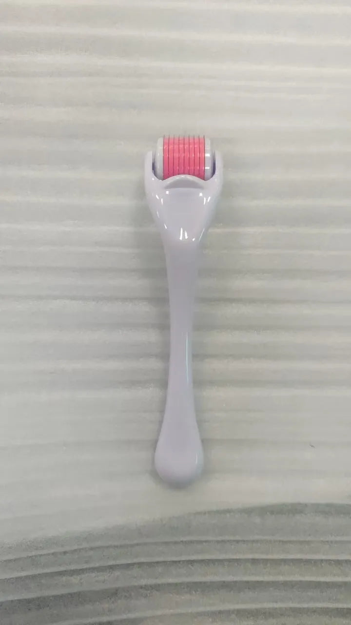 540 micro needle derma roller with black handle and purple wheel, showing adjustable needle sizes.