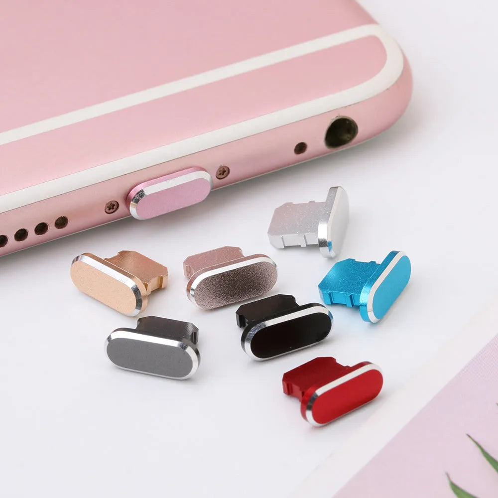 Aluminium alloy charging port dust plug for iPhone in various colours including gold, black, and rose gold.