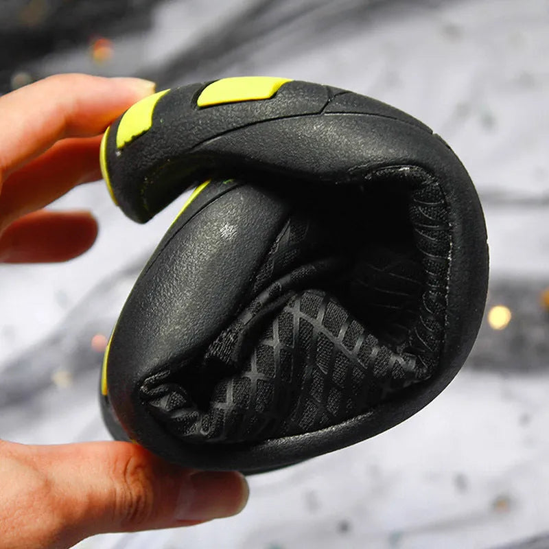 Children's black snorkeling socks and river shoes with natural rubber outsole and mesh upper