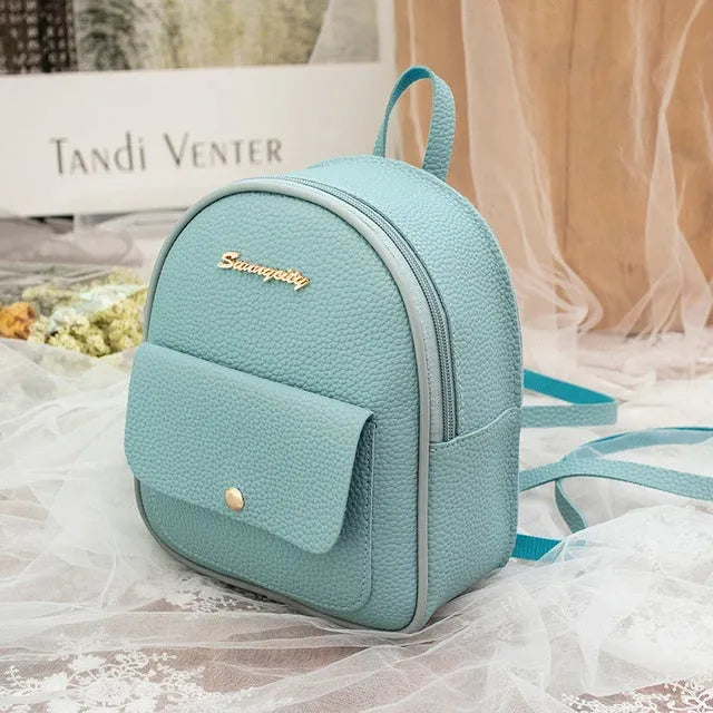 Women's small black PU shoulder backpack with a letter purse and zipper closure.