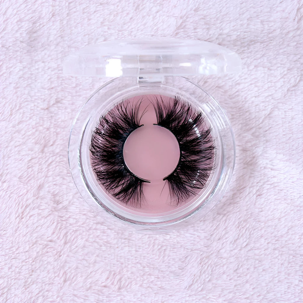 Real mink hair false eyelashes in 25MM3D length with fluffy handmade lash strands on a white background