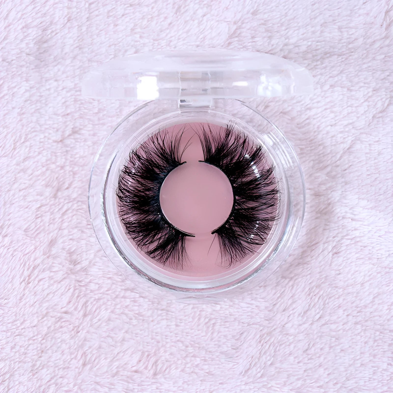 Real mink hair false eyelashes in 25MM3D length with fluffy handmade lash strands on a white background