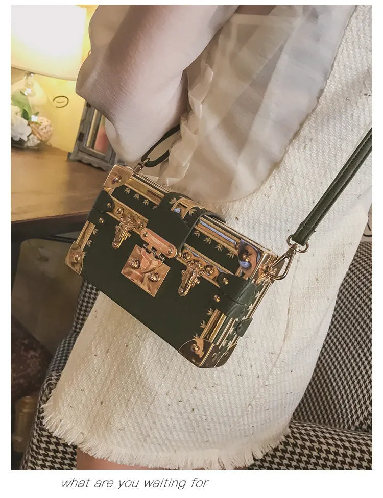 Women's hard-sided black PU leather flap shoulder bag with rivet decoration and hasp closure