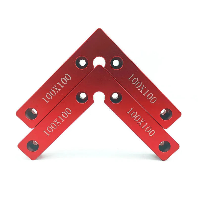 Aluminium alloy right angle positioning block for woodworking jigsaws with measurement scale.