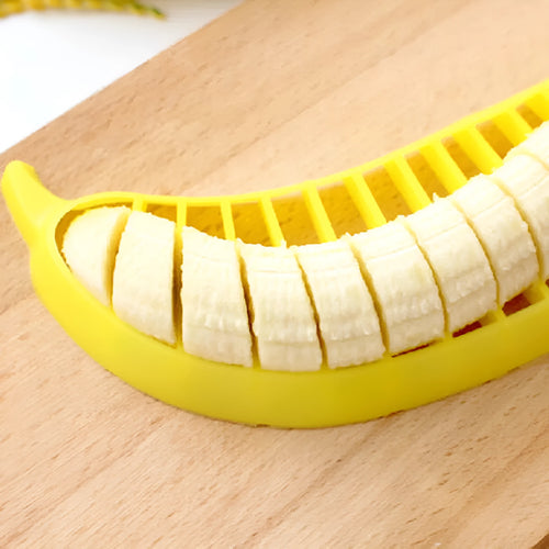 Yellow food grade PP banana slicer measuring approx 25 x 7 x 1.4 cm