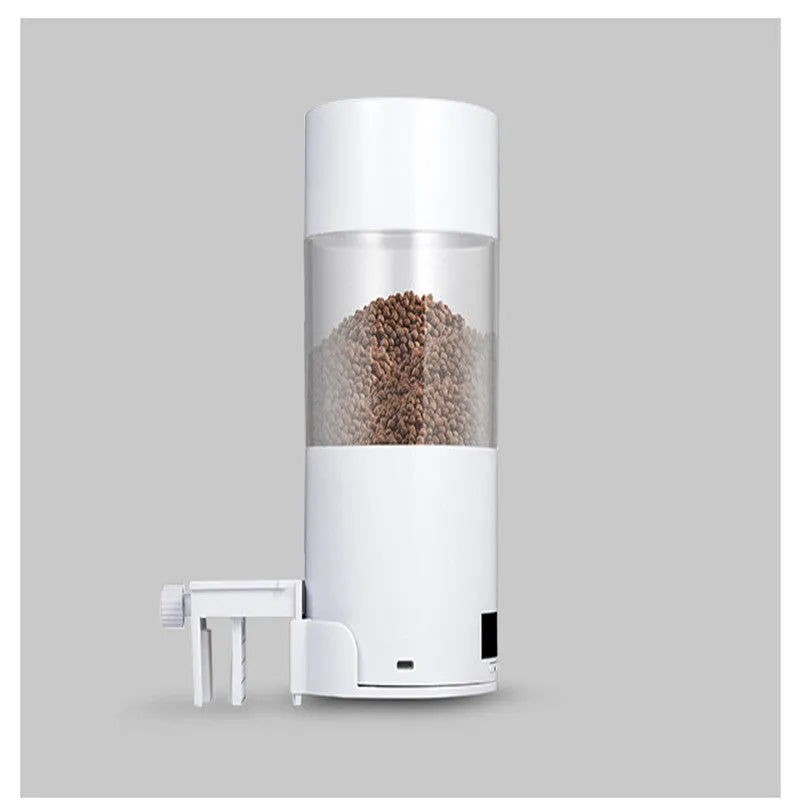 White ABS automatic fish feeder for aquarium tank with 24-hour timer, 9x9x18cm size