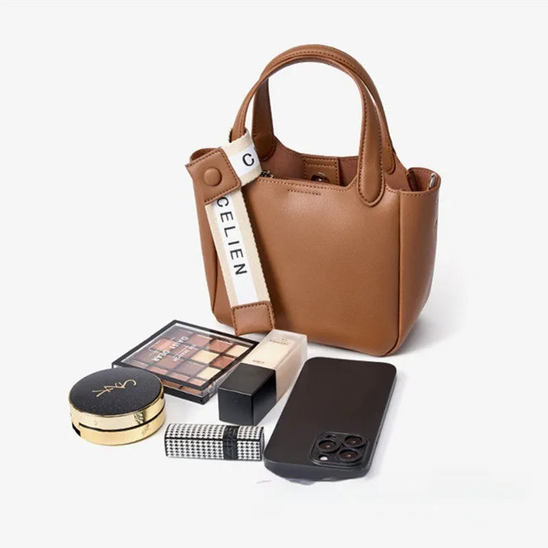 Genuine cattlehide leather cross body bucket bag in square vertical retro style.