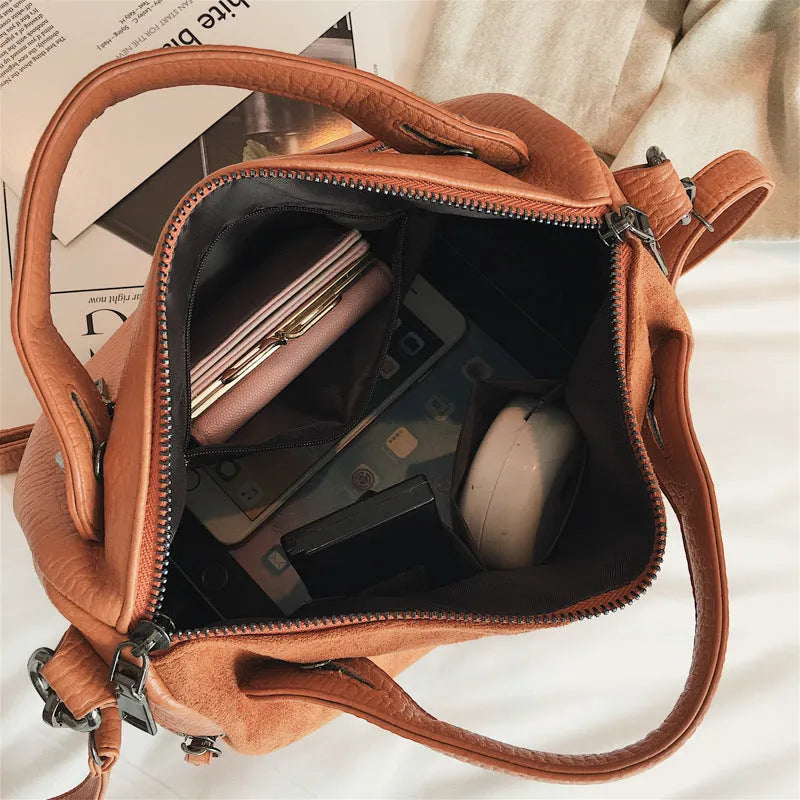 Soft PU women's casual shoulder tote bag in black, brown, or grey with smooth zipper closure