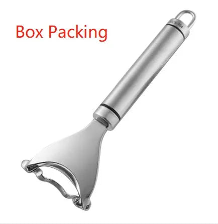 Stainless steel corn planer kitchen tool on a wooden surface