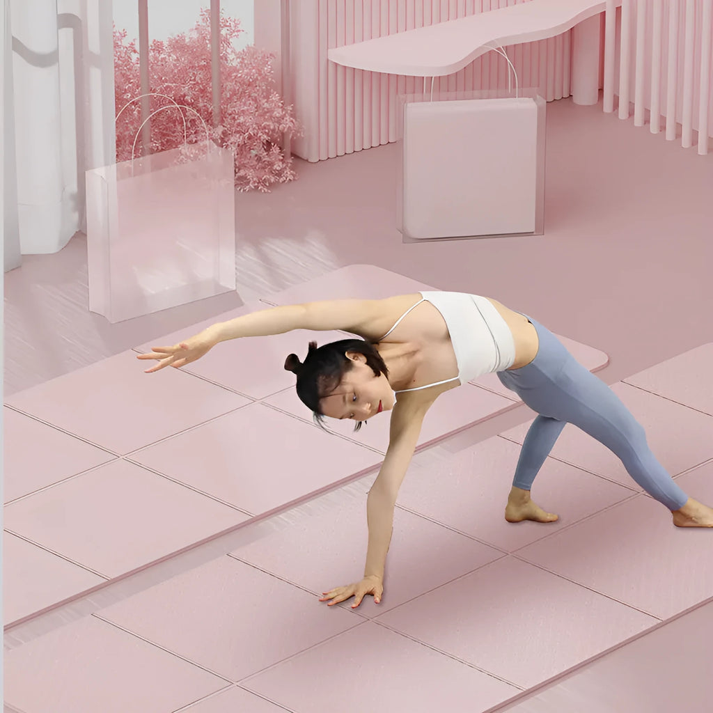 Blue foldable TPE gymnastic mat unfolded on floor showing non-slip texture and dimensions.
