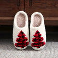 Pair of Christmas tree patterned slippers with plush upper and plastic non-slip sole