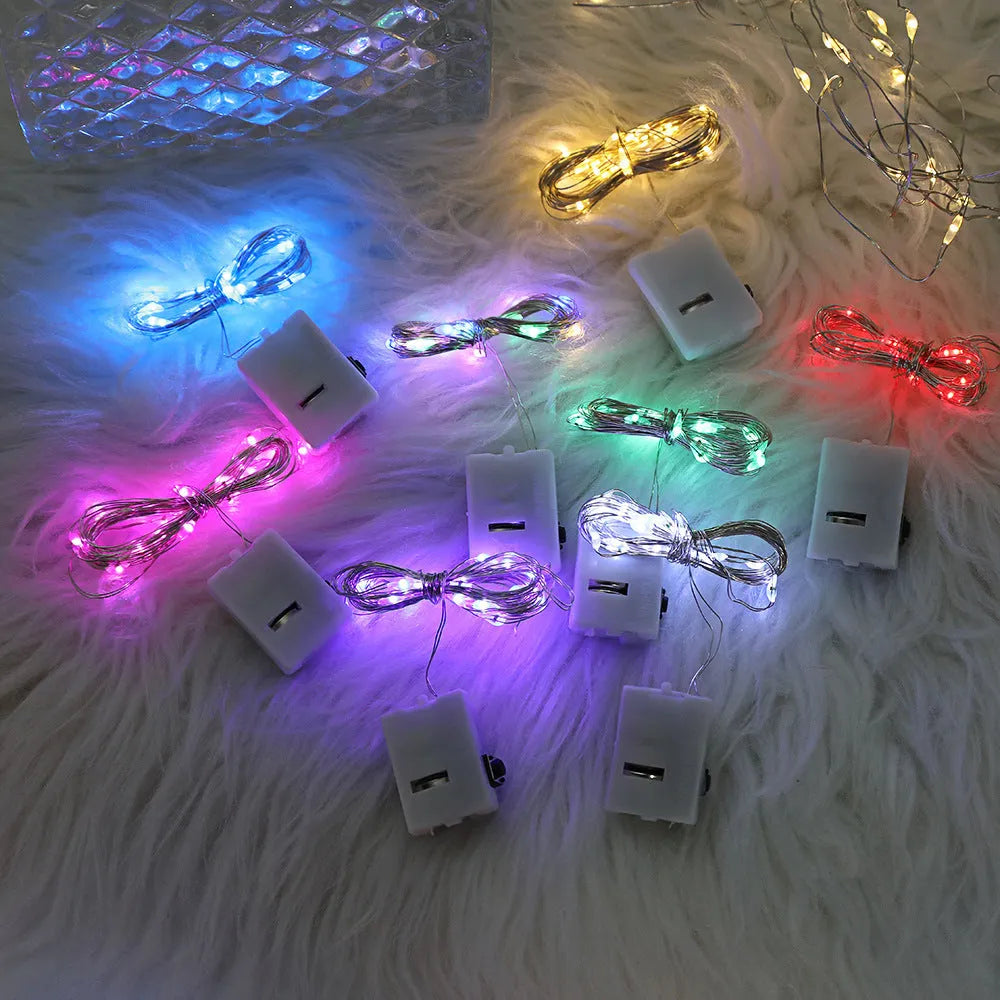 2m LED copper wire string lights in small white box with button battery power three gear colour modes
