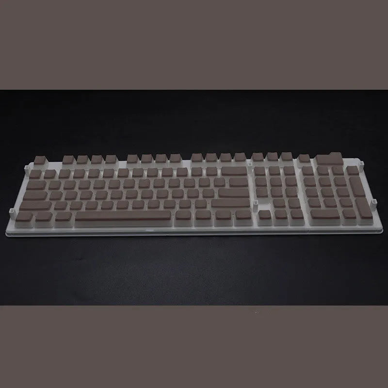 Set of 108 translucent pudding-style PBT keycaps for mechanical keyboards in assorted colours.