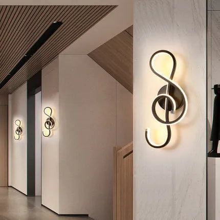 Minimalist Nordic design LED wall lamp with a silicone shade, mounted on a bedroom wall.