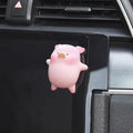 Cute cartoon pig resin car accessory figurine on a dashboard with eight style options available