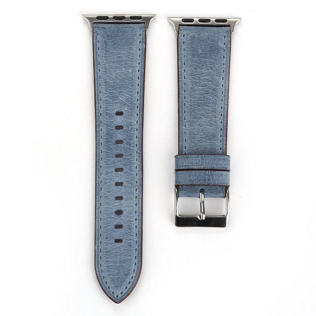 Blue leather watch strap with a silver folding buckle on a 42mm width watch case.