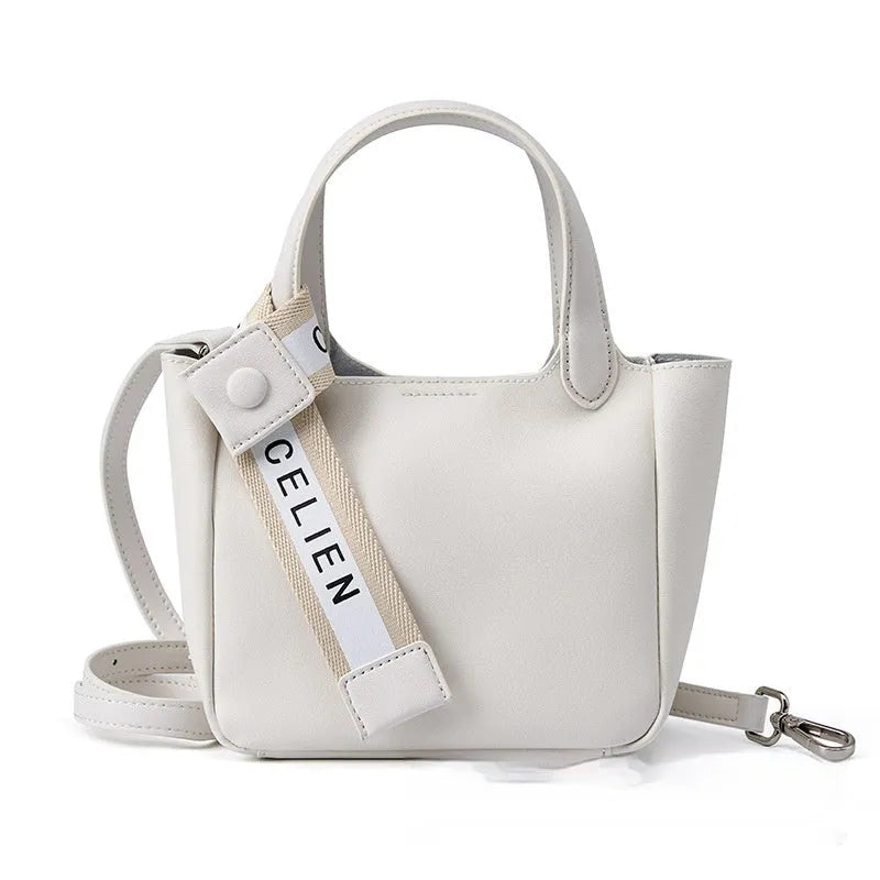 Genuine cattlehide leather cross body bucket bag in square vertical retro style.