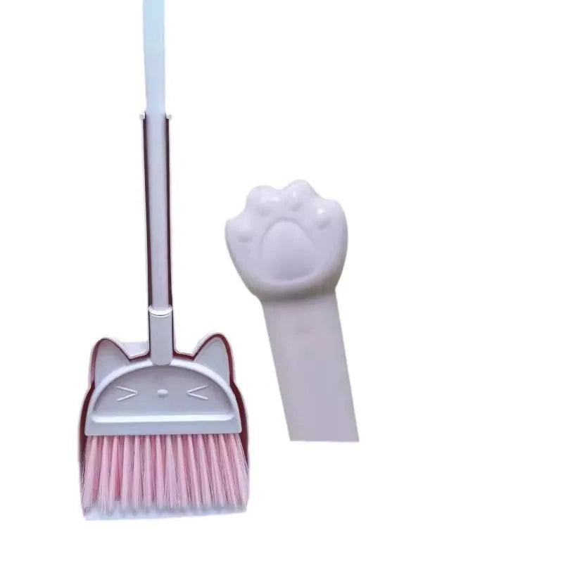 Purple, green, and beige plastic broom and dustpan set with a non-stick rotating brush holder.