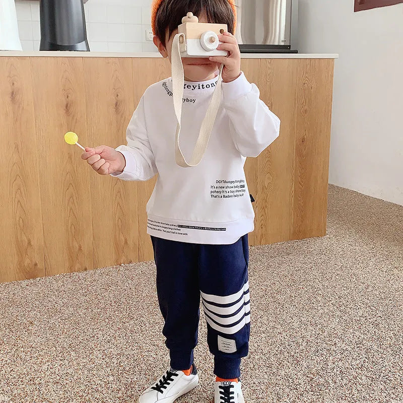 Boys' grey cotton sports trousers with elasticated waistband on child model