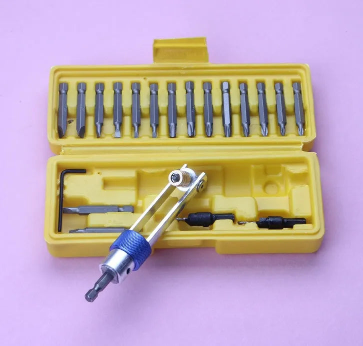 Half Time Drill driver set showing swivel head mechanism and assortment of Phillips, flathead, and countersink bits.