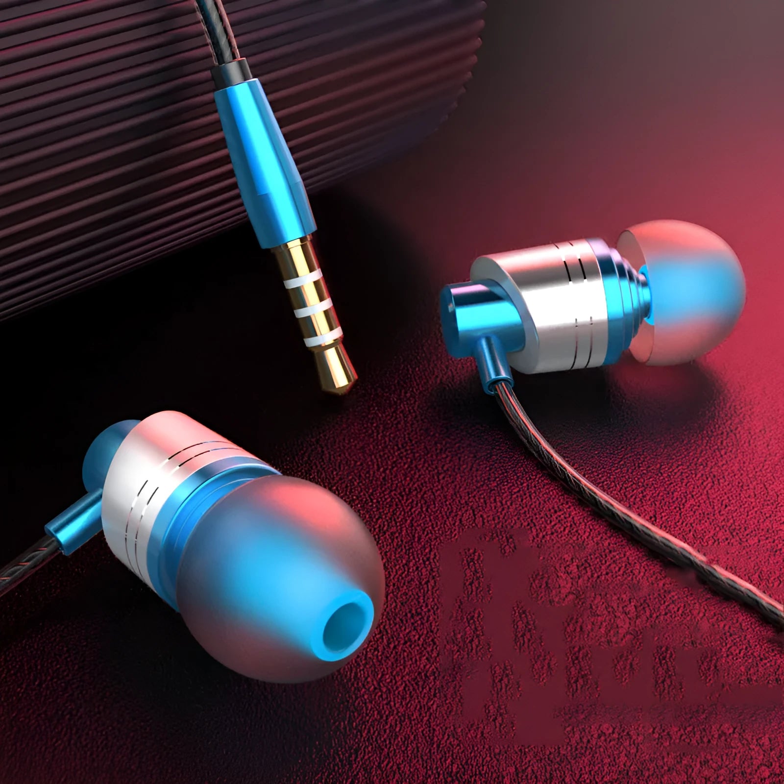 Black wired in-ear headphones with 3.5mm plug, in-line microphone, and silicone ear tips on a white background.
