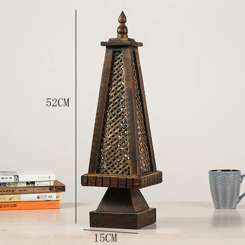 Retro wooden table lamp with hand-woven straw rattan lampshade on bedside table