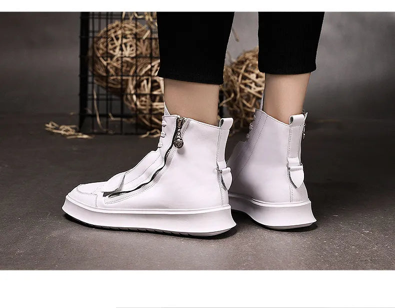 Black and white PU leather men's ankle boots with high-top sneaker design showing microfiber material texture