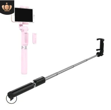 Aluminium Bluetooth selfie stick with tripod base and remote control next to a smartphone
