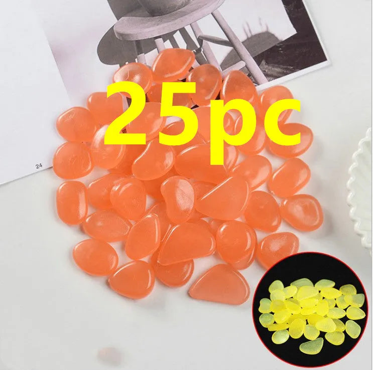 Luminous fluorescent aquarium and garden pebbles in mixed colours including dark purple, yellow, light blue, pink, orange