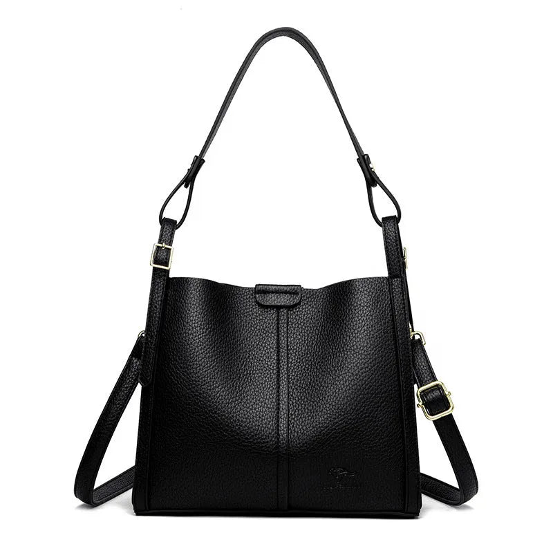 Brown retro ladies shoulder bag with zip compartments showing vertical square shape and single strap